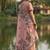 Peach floral printed linen blend saree with matching blouse piece