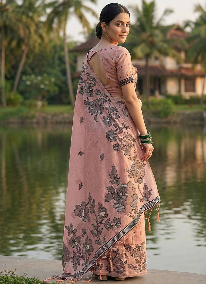 Peach floral printed linen blend saree with matching blouse piece