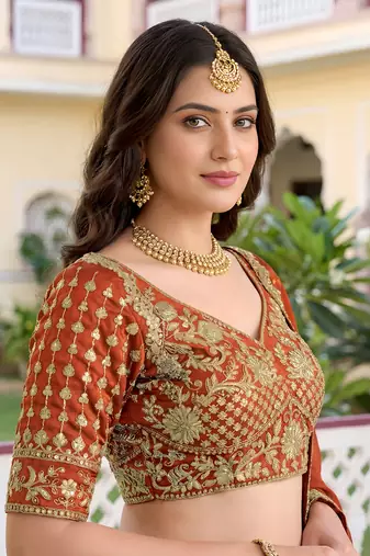 Catching Rust Orange Dori, Zari, and Sequins Embroidered Rangoli Silk mehendi ceremony wear lehenga