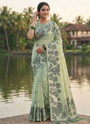 Mint green floral printed linen blend saree with matching blouse piece 1