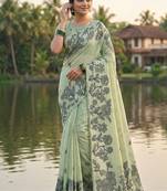 Mint green floral printed linen blend saree with matching blouse piece