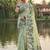 Mint green floral printed linen blend saree with matching blouse piece