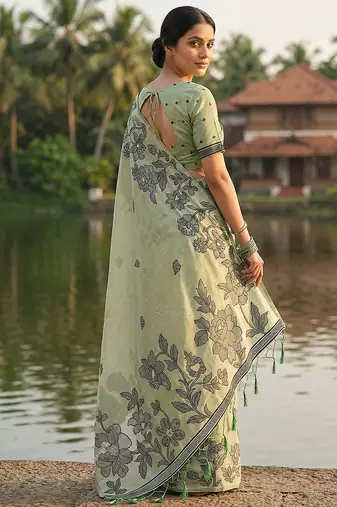 Mint green floral printed linen blend saree with matching blouse piece