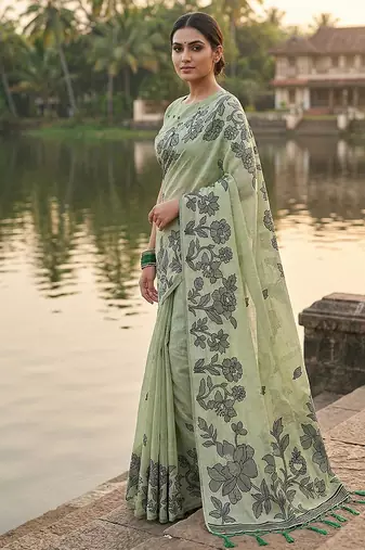Mint green floral printed linen blend saree with matching blouse piece