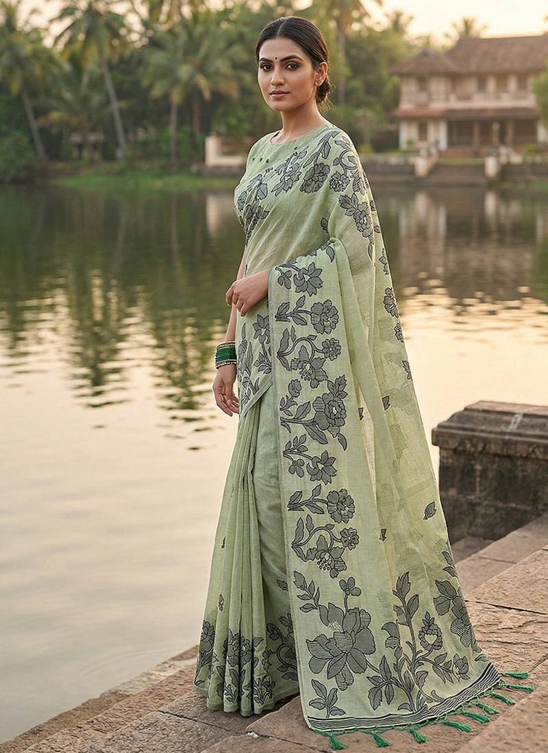 Mint green floral printed linen blend saree with matching blouse piece