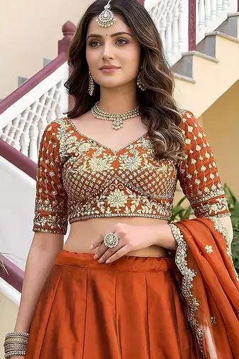Catching Rust Orange Dori, Zari, and Sequins Embroidered Rangoli Silk mehendi ceremony wear lehenga