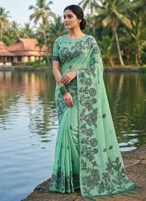 Sea green floral printed linen blend saree with matching blouse piece 1