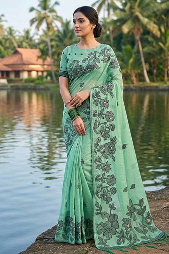 Sea green floral printed linen blend saree with matching blouse piece