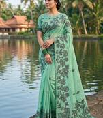 Sea green floral printed linen blend saree with matching blouse piece