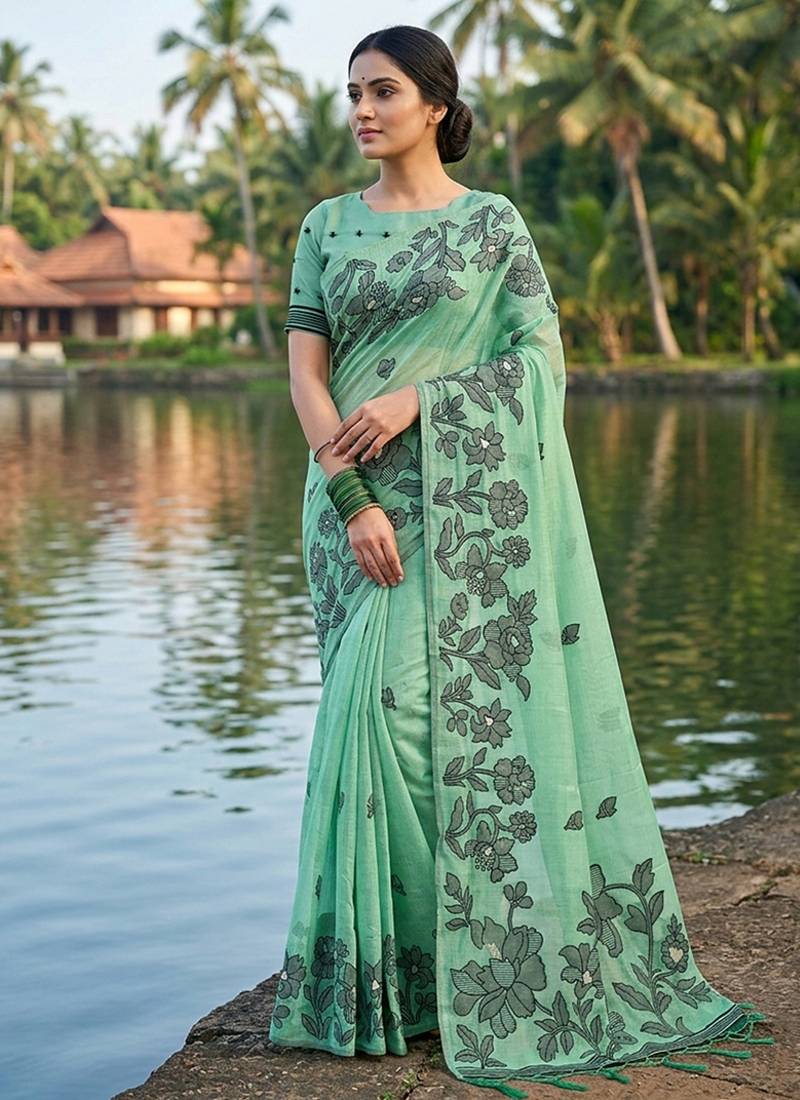 Sea green floral printed linen blend saree with matching blouse piece