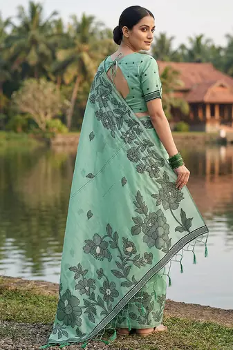 Sea green floral printed linen blend saree with matching blouse piece