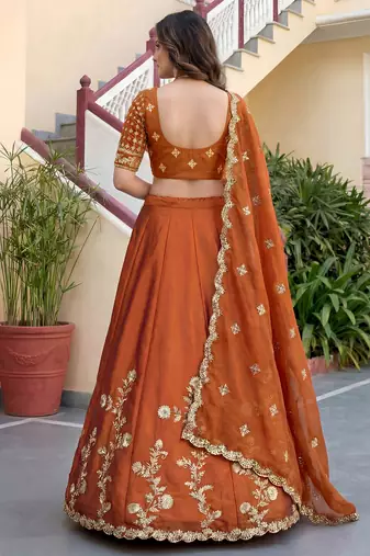 Catching Rust Orange Dori, Zari, and Sequins Embroidered Rangoli Silk mehendi ceremony wear lehenga