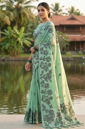 Sea green floral printed linen blend saree with matching blouse piece