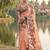 Peach floral printed linen blend saree with matching blouse piece