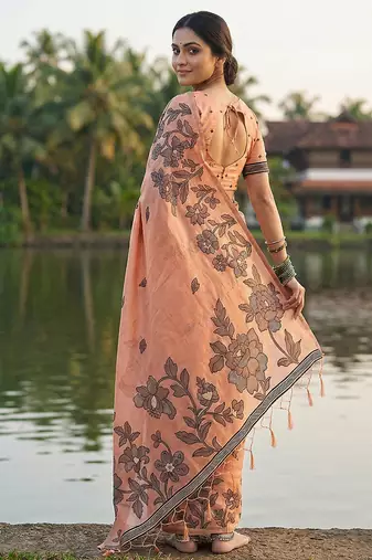 Peach floral printed linen blend saree with matching blouse piece