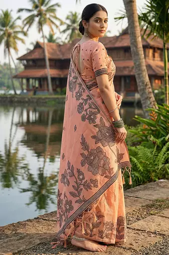 Peach floral printed linen blend saree with matching blouse piece