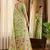 Light green linen cotton blend saree with floral print
