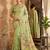 Light green linen cotton blend saree with floral print
