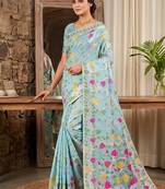 Sky blue linen cotton blend saree with floral print