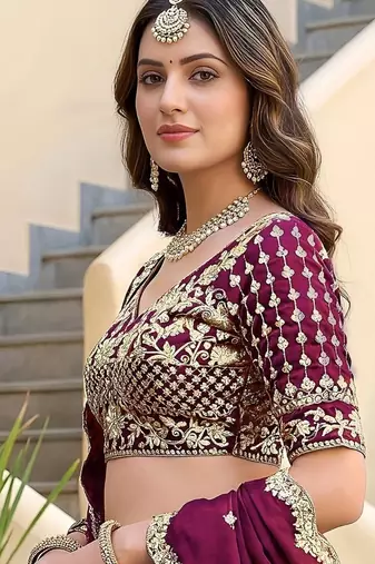 Bewitching Rich Wine Dori, Zari, and Sequins Embroidered Rangoli Silk reception wear lehenga