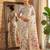 Off white linen cotton blend saree with floral print