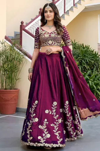 Bewitching Rich Wine Dori, Zari, and Sequins Embroidered Rangoli Silk reception wear lehenga
