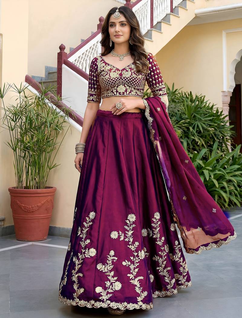 Bewitching Rich Wine Dori, Zari, and Sequins Embroidered Rangoli Silk reception wear lehenga