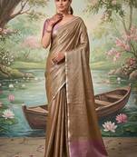Chiku tissue linen blend saree with onion pink  contrast blouse