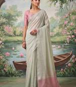Off white tissue linen blend saree with pink contrast blouse