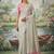 Off white tissue linen blend saree with pink contrast blouse