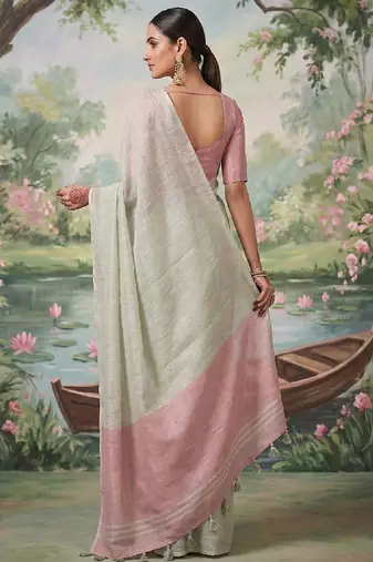 Off white tissue linen blend saree with pink contrast blouse