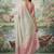 Off white tissue linen blend saree with pink contrast blouse