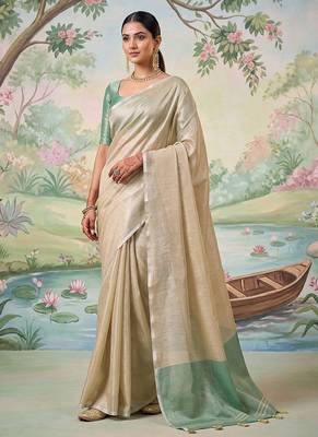 Beige tissue linen blend saree with sea green contrast blouse 1