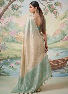 Beige tissue linen blend saree with sea green contrast blouse 2