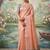 Peach tissue linen blend saree with grey contrast blouse