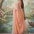 Peach tissue linen blend saree with grey contrast blouse