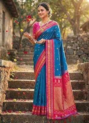 Royal blue banarasi silk blend saree with rani pink zari border 1
