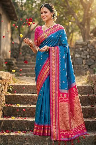 Royal blue banarasi silk blend saree with rani pink zari border
