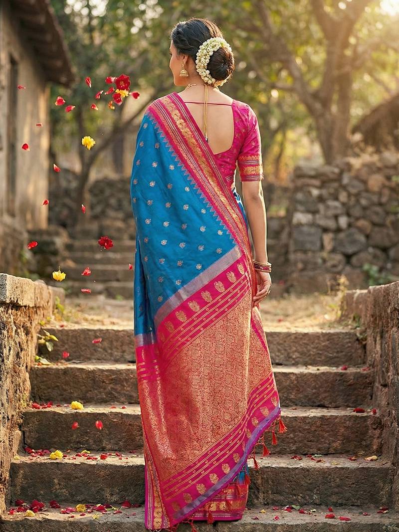 Royal blue banarasi silk blend saree with rani pink zari border