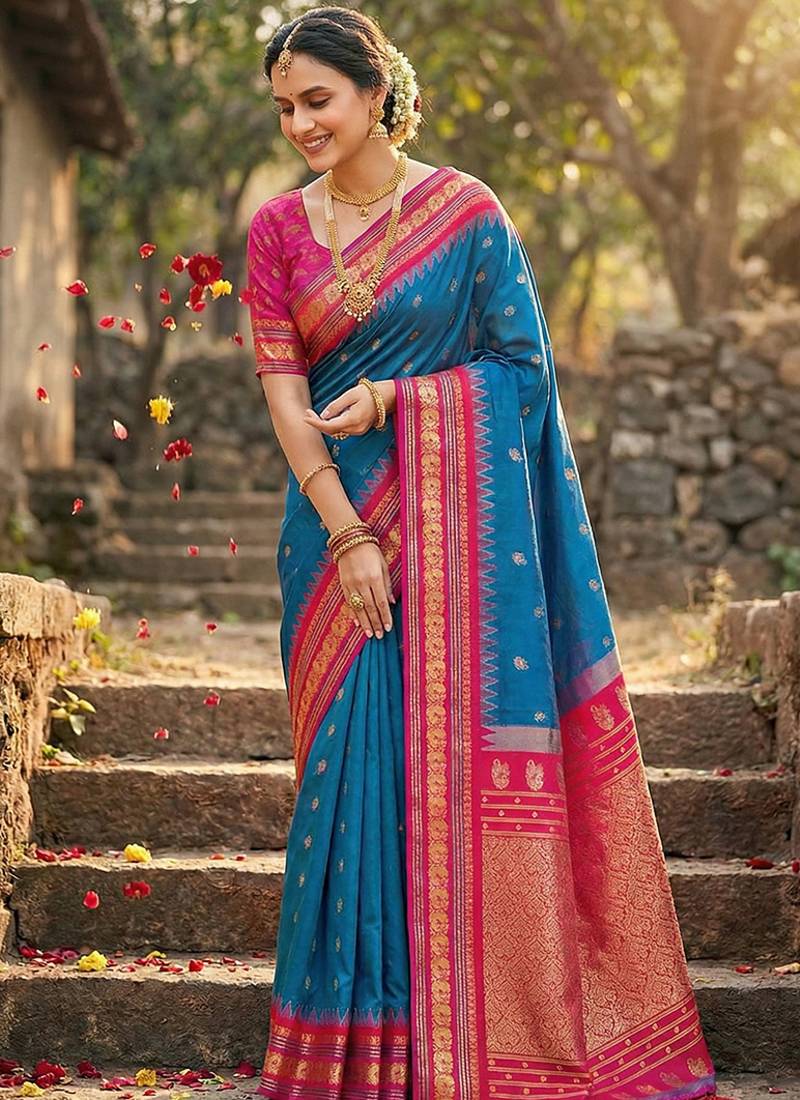 Royal blue banarasi silk blend saree with rani pink zari border