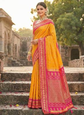 Mustard banarasi silk blend saree with rani pink zari border 1