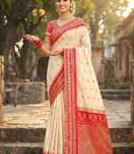Off white banarasi silk blend saree with red zari border