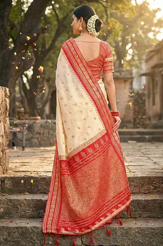 Off white banarasi silk blend saree with red zari border