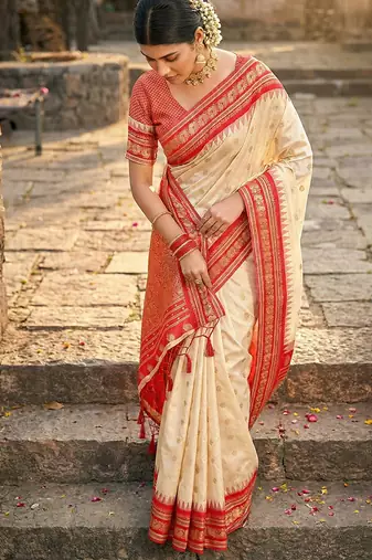 Off white banarasi silk blend saree with red zari border