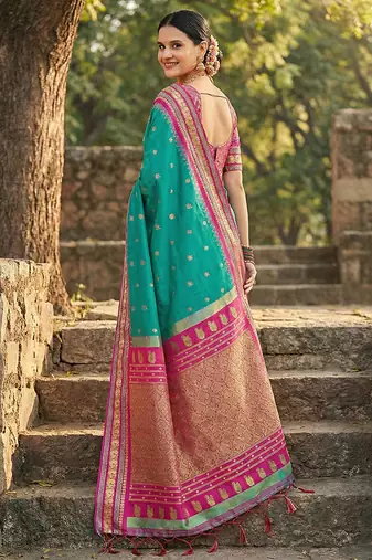 Sea green banarasi silk blend saree with magenta pink zari border