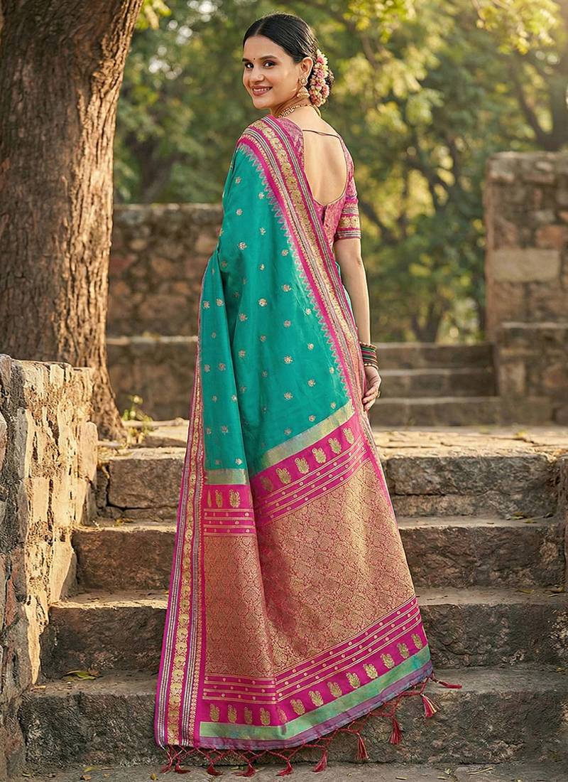 Sea green banarasi silk blend saree with magenta pink zari border