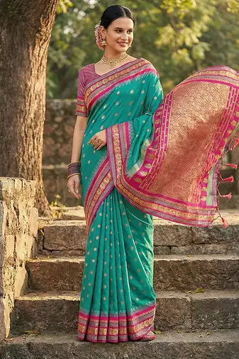 Sea green banarasi silk blend saree with magenta pink zari border