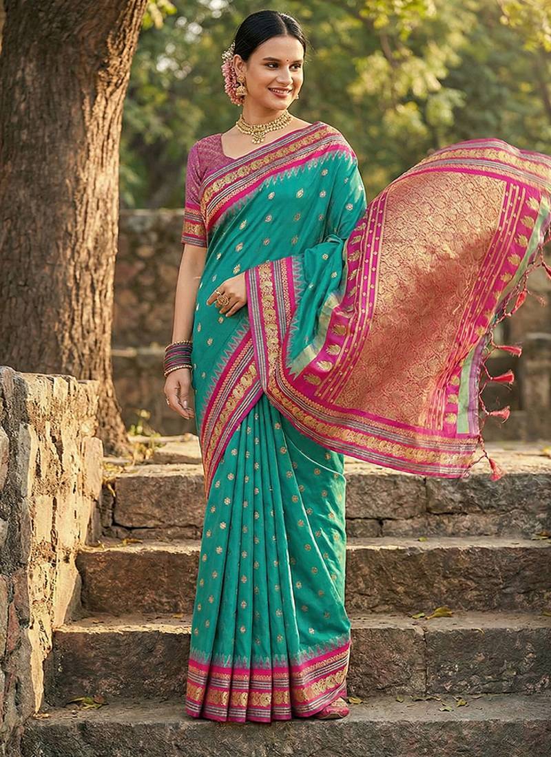 Sea green banarasi silk blend saree with magenta pink zari border