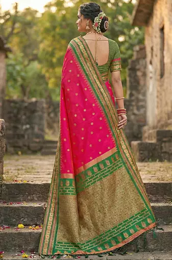 Rani pink banarasi silk blend saree with green zari border