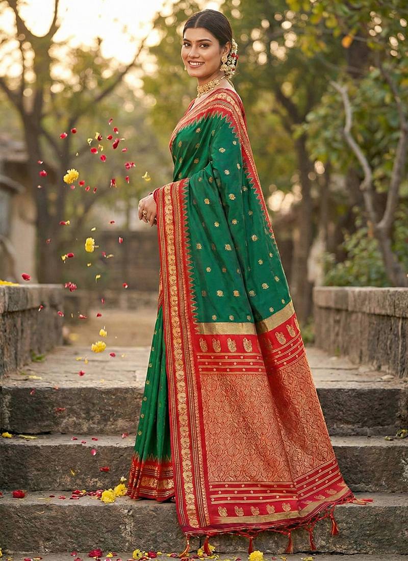 Dark green banarasi silk blend saree with red zari border